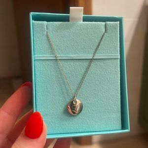Tiffany and Co: Tiffany Notes Alphabet disc charm pendant